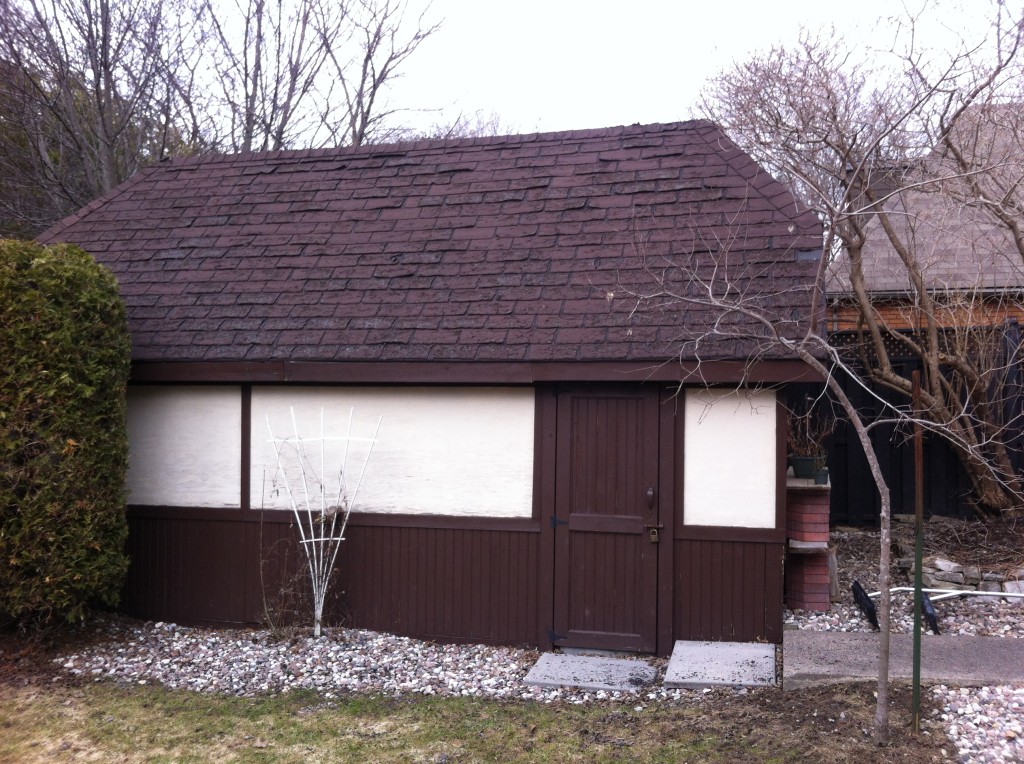 Detached garage reroof before