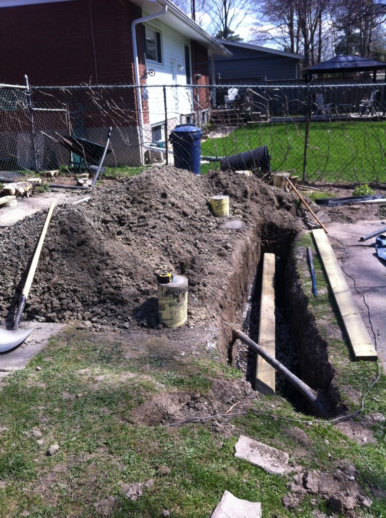 Storage shed piers and retaining wall