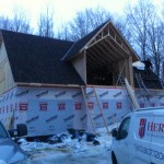 Shingling a new roof immediately after framing